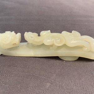 Een Chinese celadon jade gordelhaak, 18/19e eeuw — foto 10