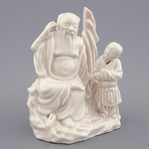 Een Chinese Dehua blanc de Chine groep met een onsterfelijke met een jongen, 18/19e eeuw — foto 1