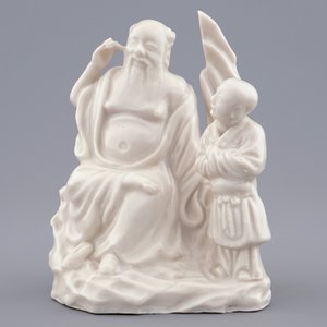 Een Chinese Dehua blanc de Chine groep met een onsterfelijke met een jongen, 18/19e eeuw — foto 2