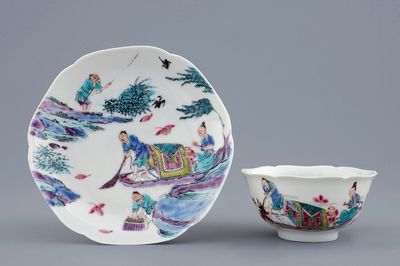 Een Chinese famille rose kop en schotel met decor van de visvangst, Yongzheng, 1723-1735