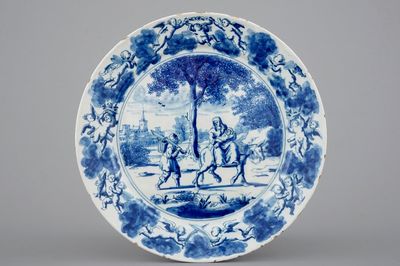 Een fijn Delfts blauw-wit bord met "De Vlucht naar Egypte", 1690-1710