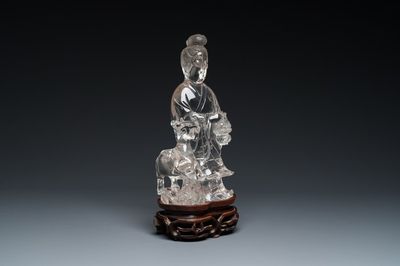 Een grote Chinese bergkristallen sculptuur van Lan Caihe, 19e eeuw
