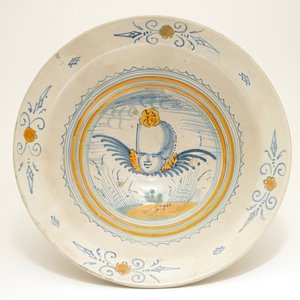 Een Haarlemse majolica kom met een engelenkop, begin 17e eeuw — foto 1