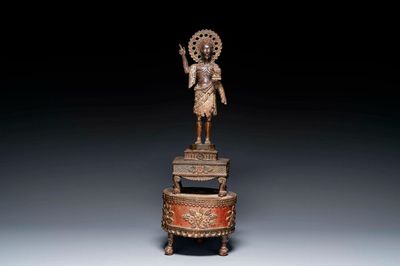 Een Indo-Portugese houten sculptuur van Johannes de Doper met een lam, gedateerd 1704