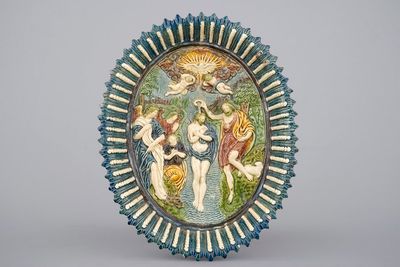 Een ovalen schotel in Palissy stijl met "De doop van Christus", 17e eeuw