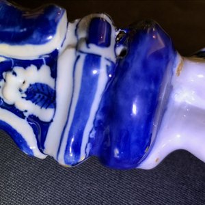 Een paar blauwwitte Delftse figuren van draailierspelers op basementen, 18e eeuw — foto 36