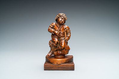 Een palmhouten figuur van een bedelaar, Vlaanderen, 17/18e eeuw