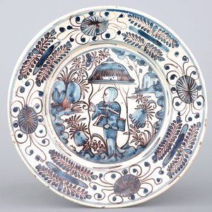 Een Portugese majolica schotel met chinoiseriedecor, ca. 1660 — foto 1