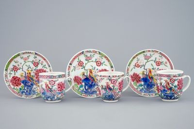 Een set van drie Chinese famille rose kop en schotels met vogels en bloemen, Yongzheng/Qianlong