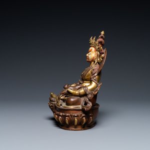 Een Sino-Tibetaanse deels vergulde bronzen figuur van Jambhala met inscripties op de rug, 19e eeuw — foto 3