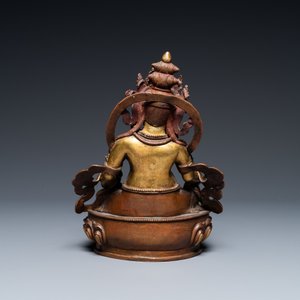 Een Sino-Tibetaanse deels vergulde bronzen figuur van Jambhala met inscripties op de rug, 19e eeuw — foto 4