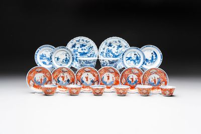 Eight Chinese blue, white and iron-red cups and twelve saucers, Kangxi/Yongzheng