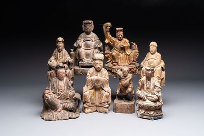 Eight various Chinese lacquered wooden figures, 19th C.