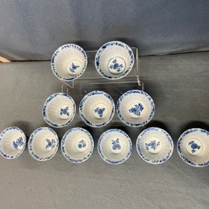 Eleven Chinese blue and white lobed cups and saucers, Kangxi — photo 12