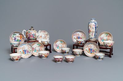 Eleven Chinese famille rose 'mandarin' cups, eight saucers, a teapot and a vase, Qianlong