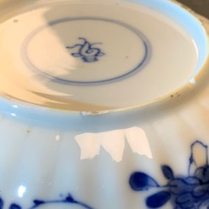 Elf gelobde Chinese blauw-witte koppen en schotels, Kangxi — foto 20