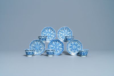 Five Chinese blue and white cups and saucers, Kangxi mark, 19th C.