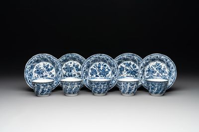 Five Chinese blue and white cups and saucers with floral design, Yu 玉 mark, Kangxi