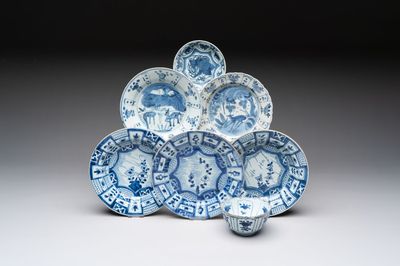 Five Chinese blue and white 'kraak' and 'kraak'-style plates, a saucer and a bowl, Ming/Qing
