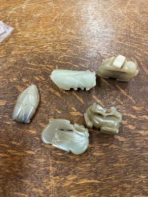 Five Chinese celadon and russet jade carvings, 19th C. — photo 1