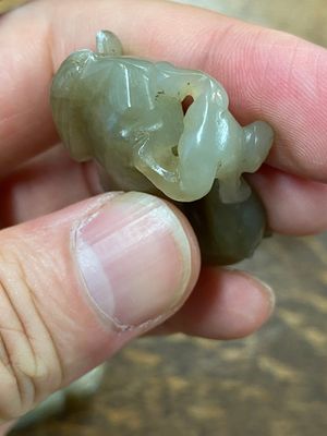 Five Chinese celadon and russet jade carvings, 19th C. — photo 16