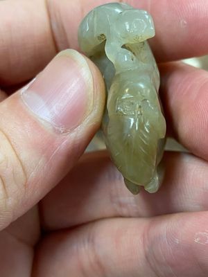 Five Chinese celadon and russet jade carvings, 19th C. — photo 17