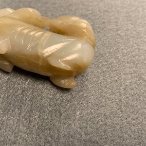 Five Chinese celadon and russet jade carvings, 19th C. — photo 17