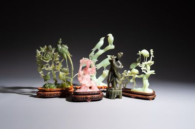 Five Chinese hardstone carvings, four with wooden stands, 20th C.