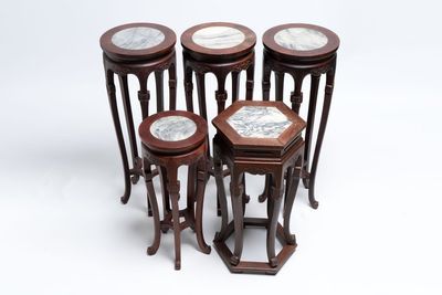 Five Chinese marble-topped hongmu stands, 20th C.