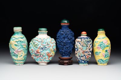 Five Chinese moulded famille rose snuff bottles, Qianlong mark, 19th C.