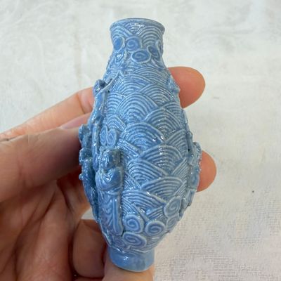 Five Chinese relief-moulded snuff bottles — photo 22