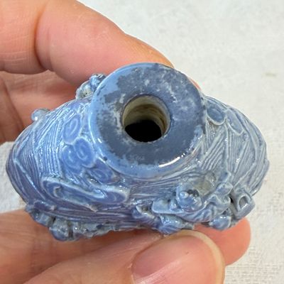 Five Chinese relief-moulded snuff bottles — photo 25