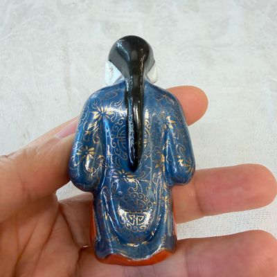 Five Chinese relief-moulded snuff bottles — photo 29