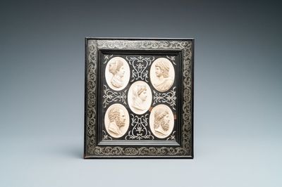 Five ivory portrait medallions set in a pewter-mounted ebony frame, France and/or Italy, 19th C.