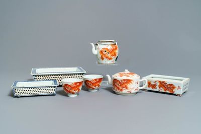 Five pieces of Chinese iron red-decorated porcelain and two double-walled blue and white jardinières, 19th C.