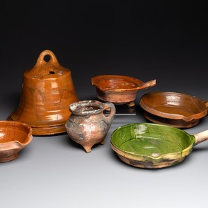 Five pieces of glazed earthenware cooking utensils and a fire bell, probably The Netherlands, 17th C. — photo 1