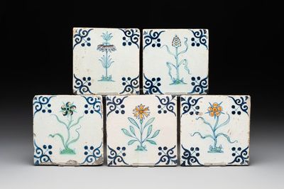 Five polychrome Dutch Delft 'flower' tiles, 17th C.