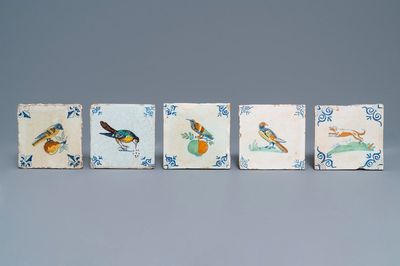 Five polychrome Dutch Delft tiles with birds and a dog, 17th C.
