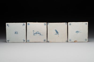 Four blue and white Dutch Delft elephant, boars, bird and mouse tiles, 17th C.
