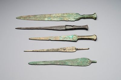 Four bronze daggers and a sword, Luristan and Syria, 1st C. B.C.