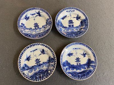 Four Chinese blue and white 'cranes and pagoda' saucers, ex-collection of August the Strong, Kangxi — photo 1