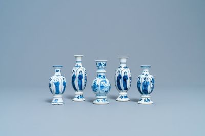 Four Chinese blue and white miniature vases and a huqqa base, Kangxi