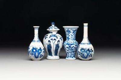 Four Chinese blue and white miniature vases, one with cover, Kangxi
