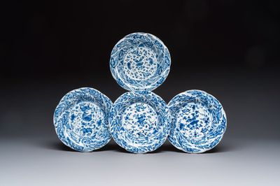 Four Chinese blue and white moulded plates with floral design, Kangxi