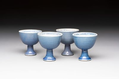 Four Chinese blue-glazed 'Hatcher Cargo' stem cups, Transitional period