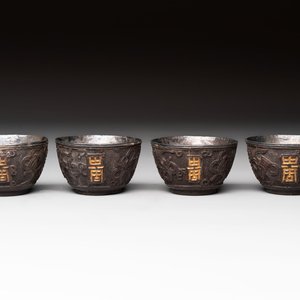 Four Chinese carved and silver-lined coconut cups, 19/20th C. — photo 1