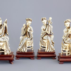 Four Chinese carved ivory ladies with instruments on wooden stands, ca. 1900 — photo 1