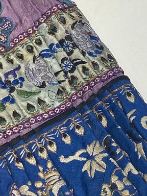 Four Chinese embroidered silk skirts and three yellow 'magua' jackets, 19/20th C. — photo 34