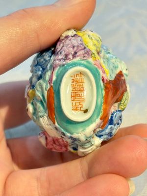 Four Chinese famille rose moulded 'Luohan' snuff bottles, Qianlong marks, 19th C. — photo 14