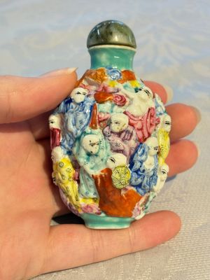 Four Chinese famille rose moulded 'Luohan' snuff bottles, Qianlong marks, 19th C. — photo 9